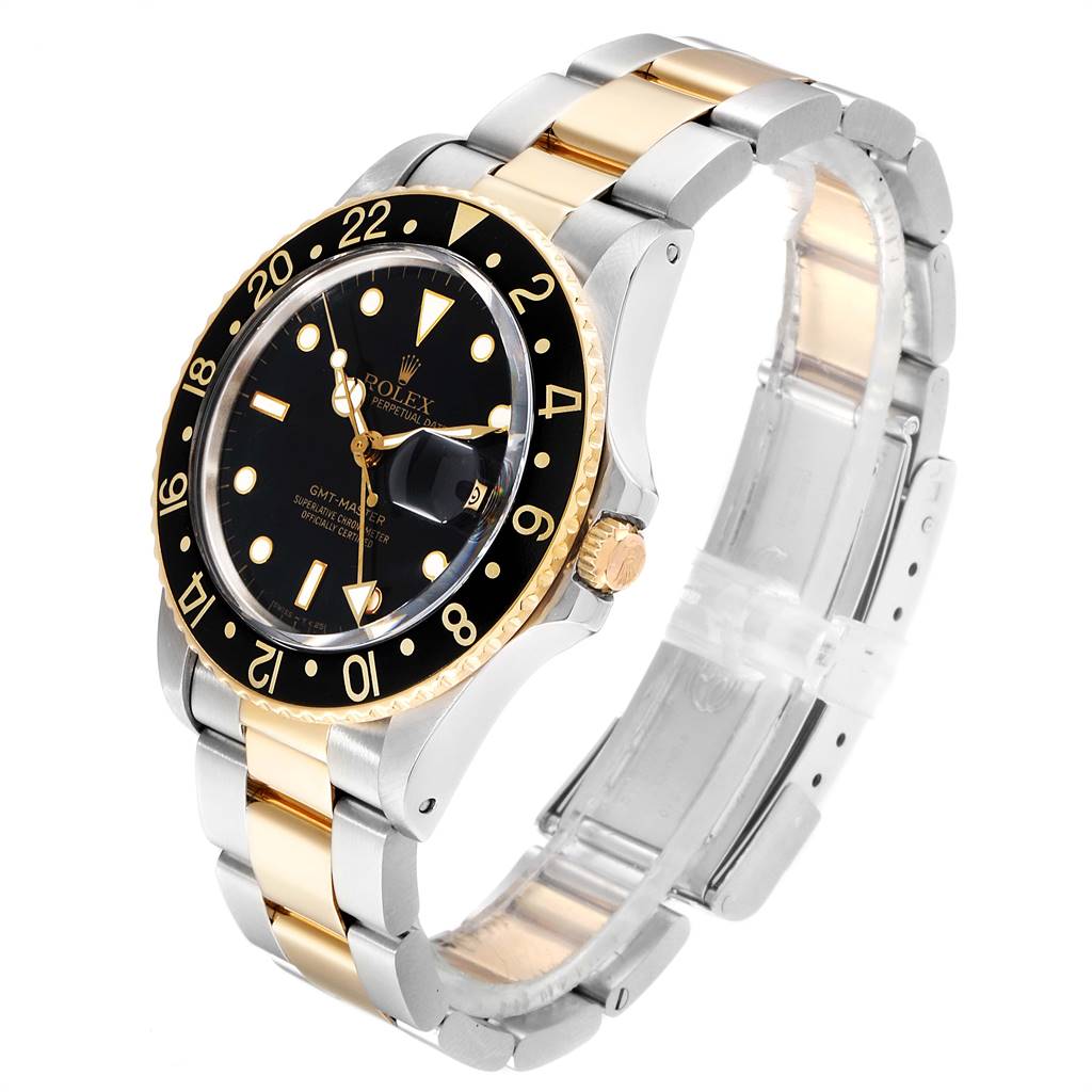 The image shows a Rolex Vintage Collection 16753 Men's Steel and Gold (two tone) Black Dial 16753 Men's Steel and Gold (two tone) Black Dial GMT-Master watch angled from the top and side, highlighting the bezel, dial, and bracelet.