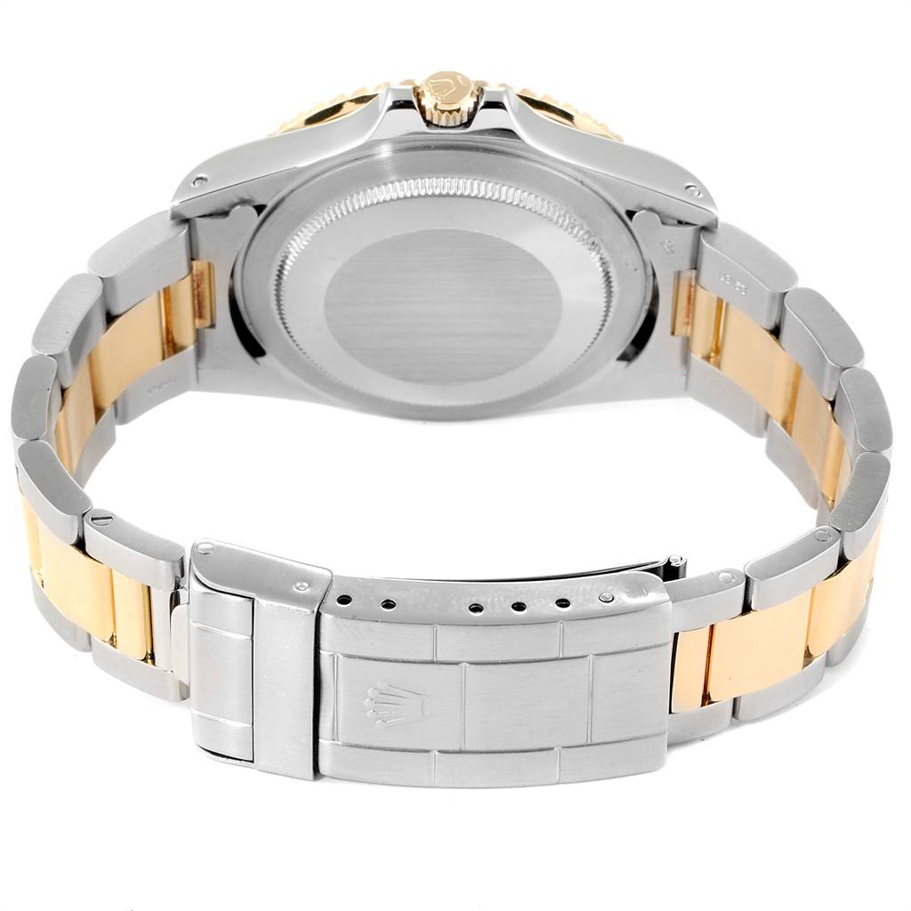 This image displays the back and clasp of a Rolex Vintage Collection 16753 Men's Steel and Gold (two tone) Black Dial 16753 Men's Steel and Gold (two tone) Black Dial watch, focusing on its bracelet and case back.