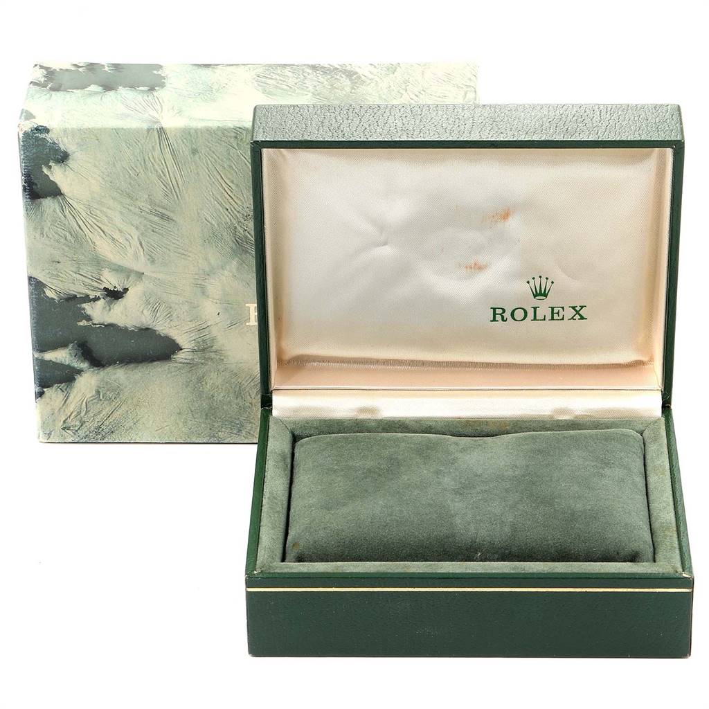 The image shows an open Rolex Vintage Collection 16753 Men's Steel and Gold (two tone) Black Dial 16753 Men's Steel and Gold (two tone) Black Dial watch box with its lid raised and the interior of the packaging exposed.