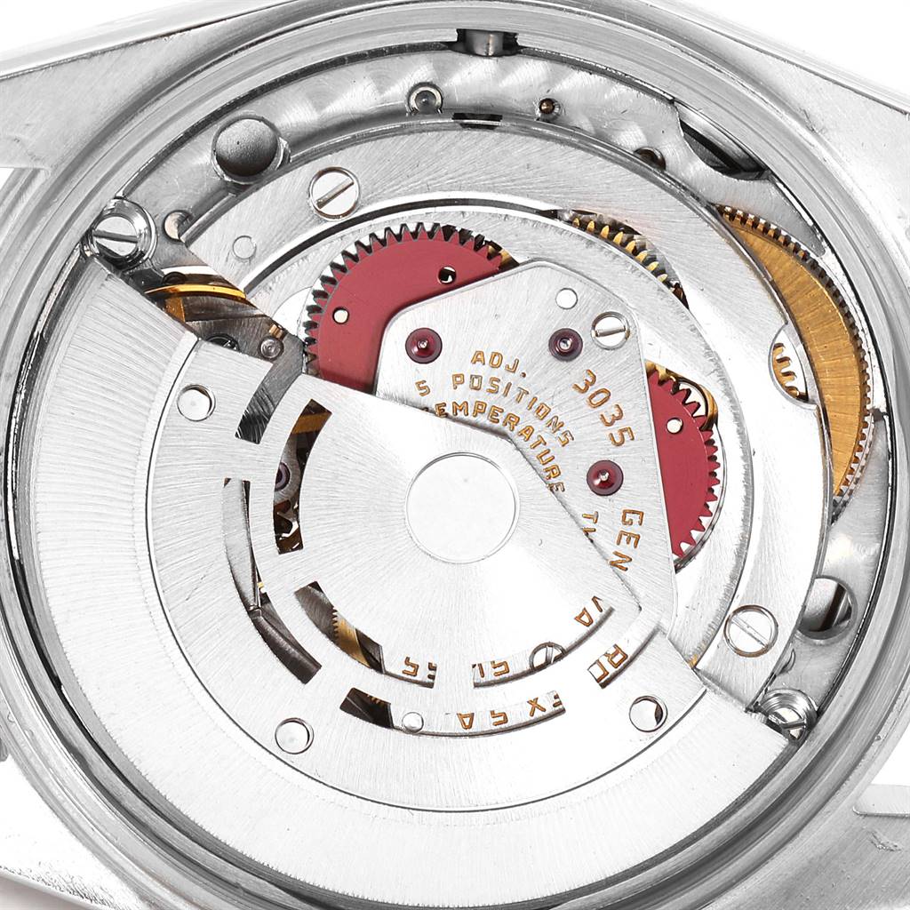 This image shows the internal movement mechanism of a Rolex Vintage Collection 15000 Men
s Stainless Steel Silver Dial 15000 Men
s Stainless Steel Silver Dial watch from an overhead angle.