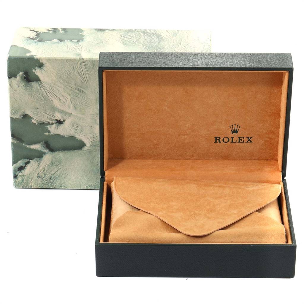 The image shows an open box for the Rolex Vintage Collection 15000 Men
s Stainless Steel Silver Dial 15000 Men
s Stainless Steel Silver Dial model, revealing a tan interior and a protective pouch.