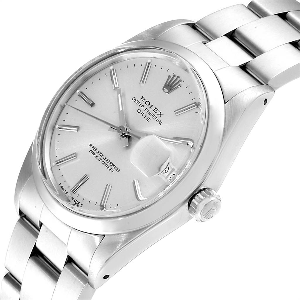 The image shows a Rolex Vintage Collection 15000 Men
s Stainless Steel Silver Dial 15000 Men
s Stainless Steel Silver Dial Oyster Perpetual Date watch at a three-quarter angle, featuring the dial, crown, and bracelet.