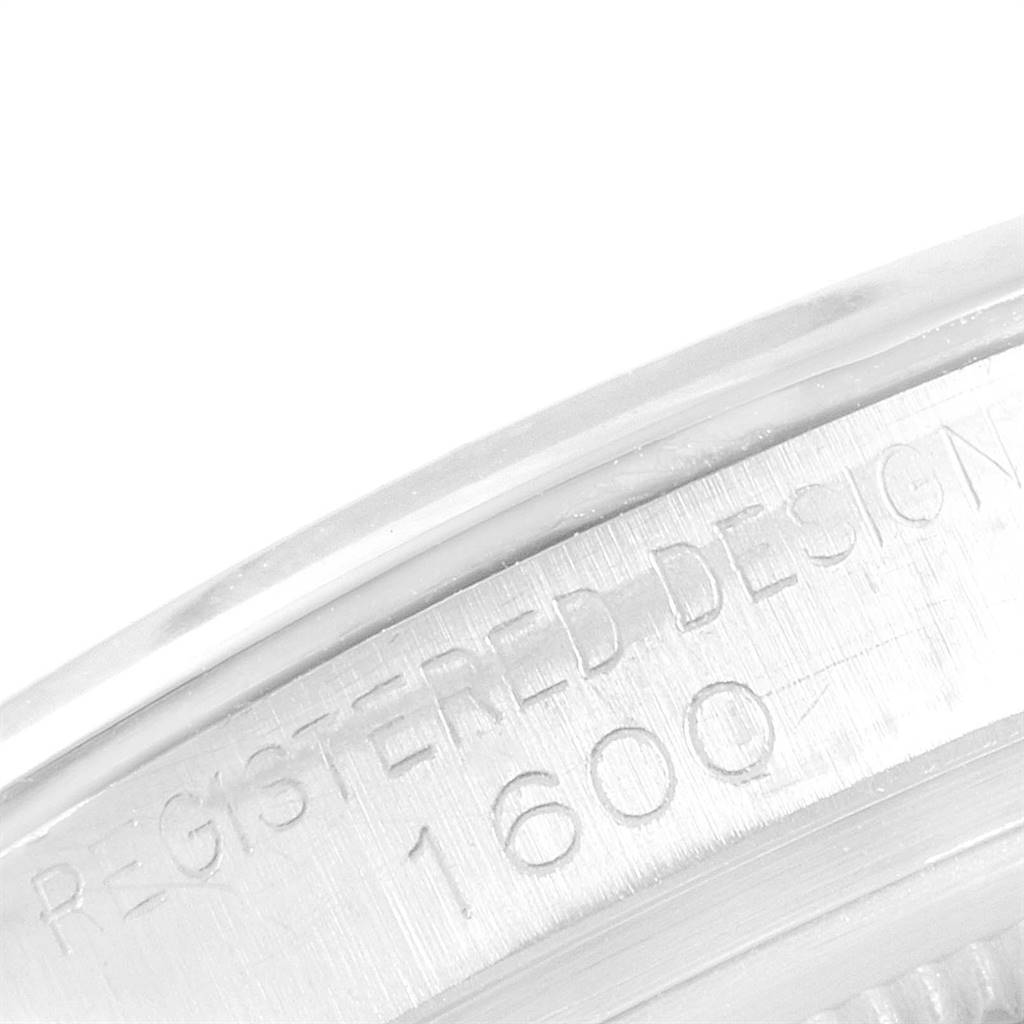This image shows a close-up of the case back engraving on a Vintage Collection model by Rolex, highlighting the model number "1600".