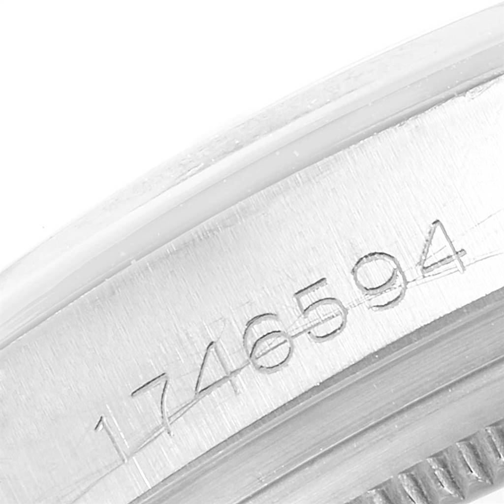 The image shows a close-up of the engraved serial number on the side of the Rolex Vintage Collection 1600 Men's Stainless Steel White Dial 1600 Men's Stainless Steel White Dial watch.