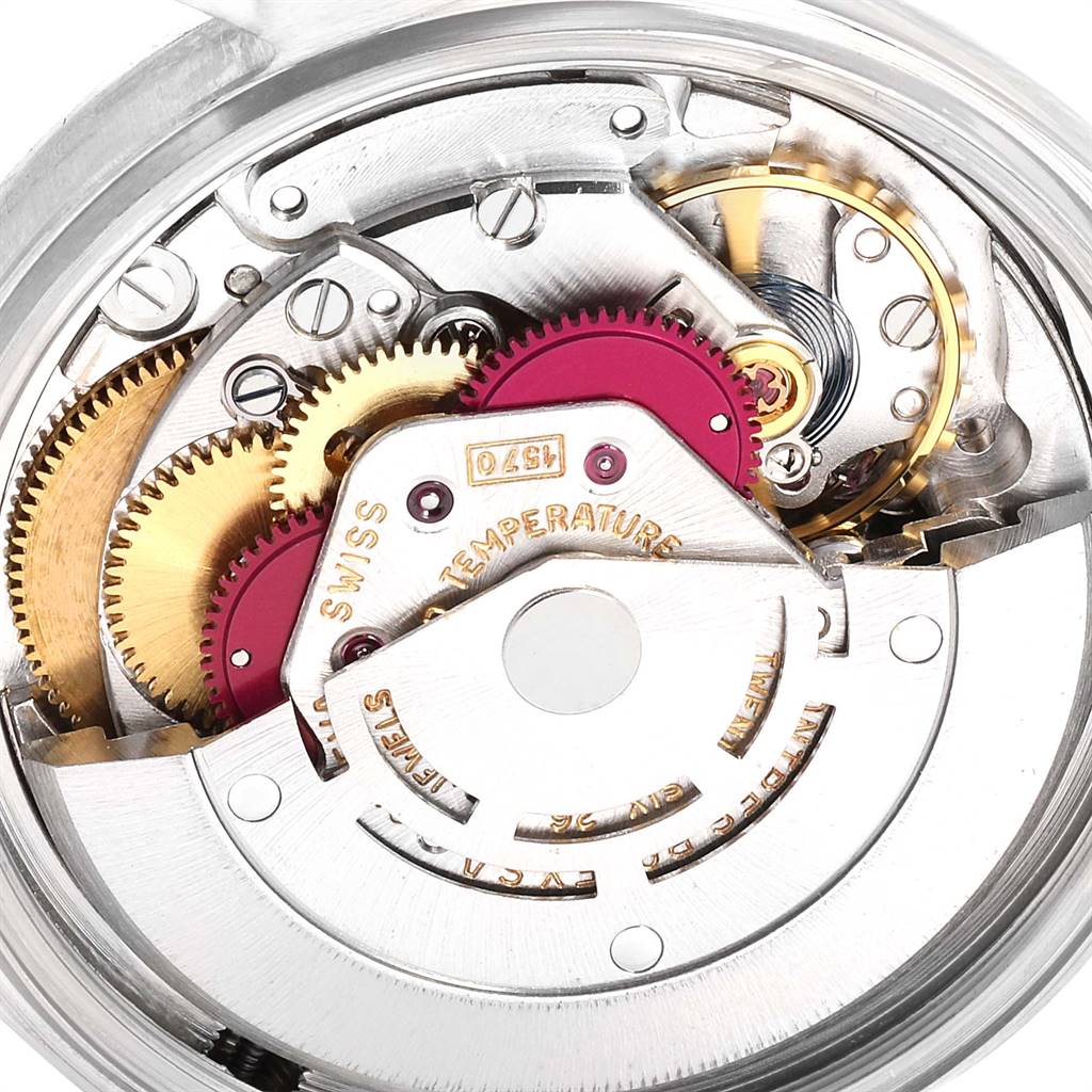 The image shows the intricate internal mechanism of the Vintage Collection model by Rolex from a macro angle.
