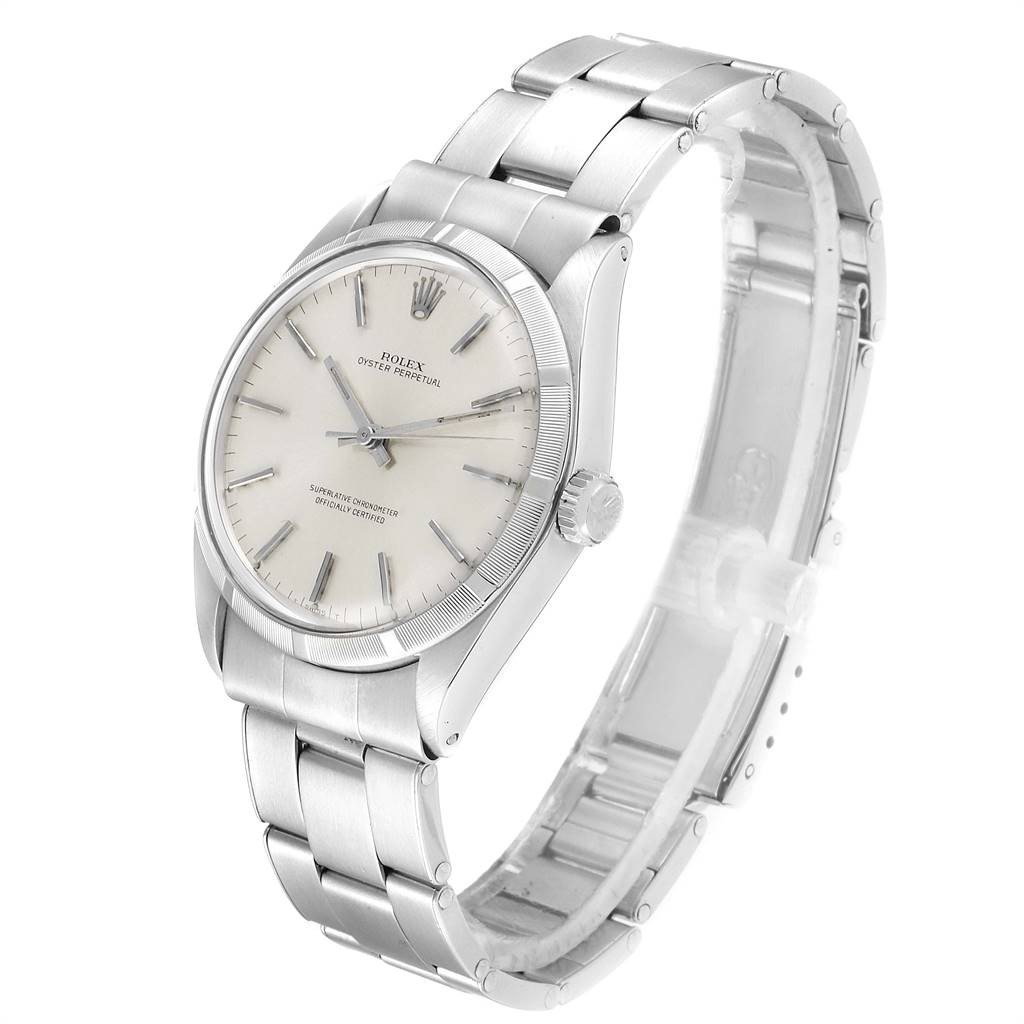 The image shows a Rolex Vintage Collection 1003 Men
s Stainless Steel Silver Dial 1003 Men
s Stainless Steel Silver Dial watch at a slight angle, displaying its face, bezel, case, and bracelet.