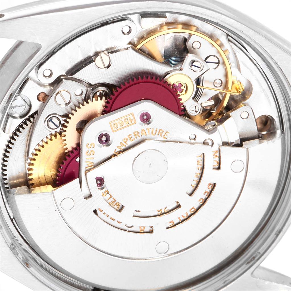 This image shows the intricate inner mechanism of a Rolex Vintage Collection 1003 Men
s Stainless Steel Silver Dial 1003 Men
s Stainless Steel Silver Dial watch at a close-up angle.
