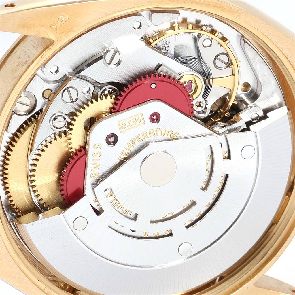 This image shows the inner mechanical components and movement of the Rolex Vintage Collection 1002 Men
s Yellow Gold Champagne Dial 1002 Men
s Yellow Gold Champagne Dial watch from the back angle.