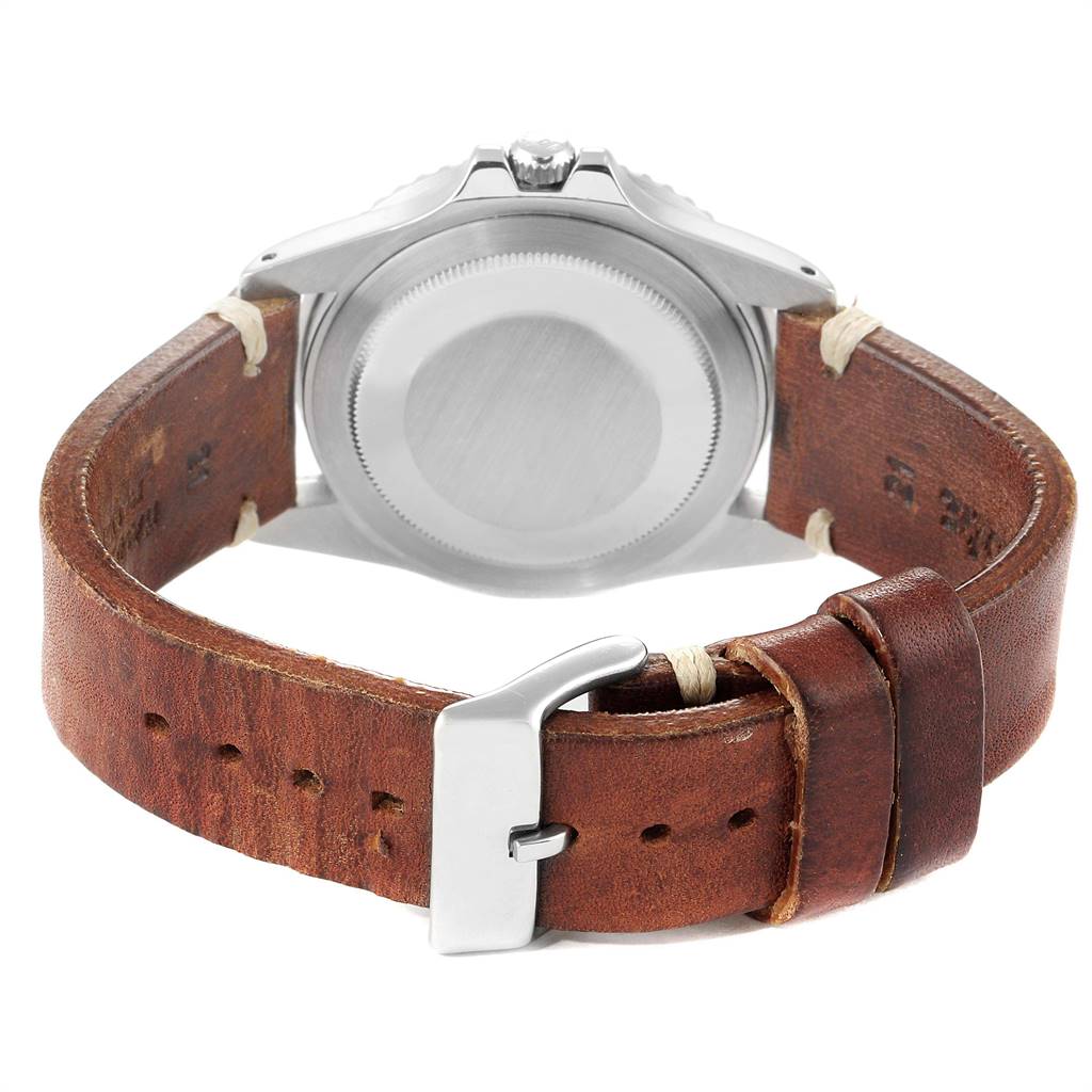 This image shows the back view of a Rolex Vintage Collection 1675 Men
s Stainless Steel Black Dial 1675 Men
s Stainless Steel Black Dial watch, displaying its case back and leather strap.