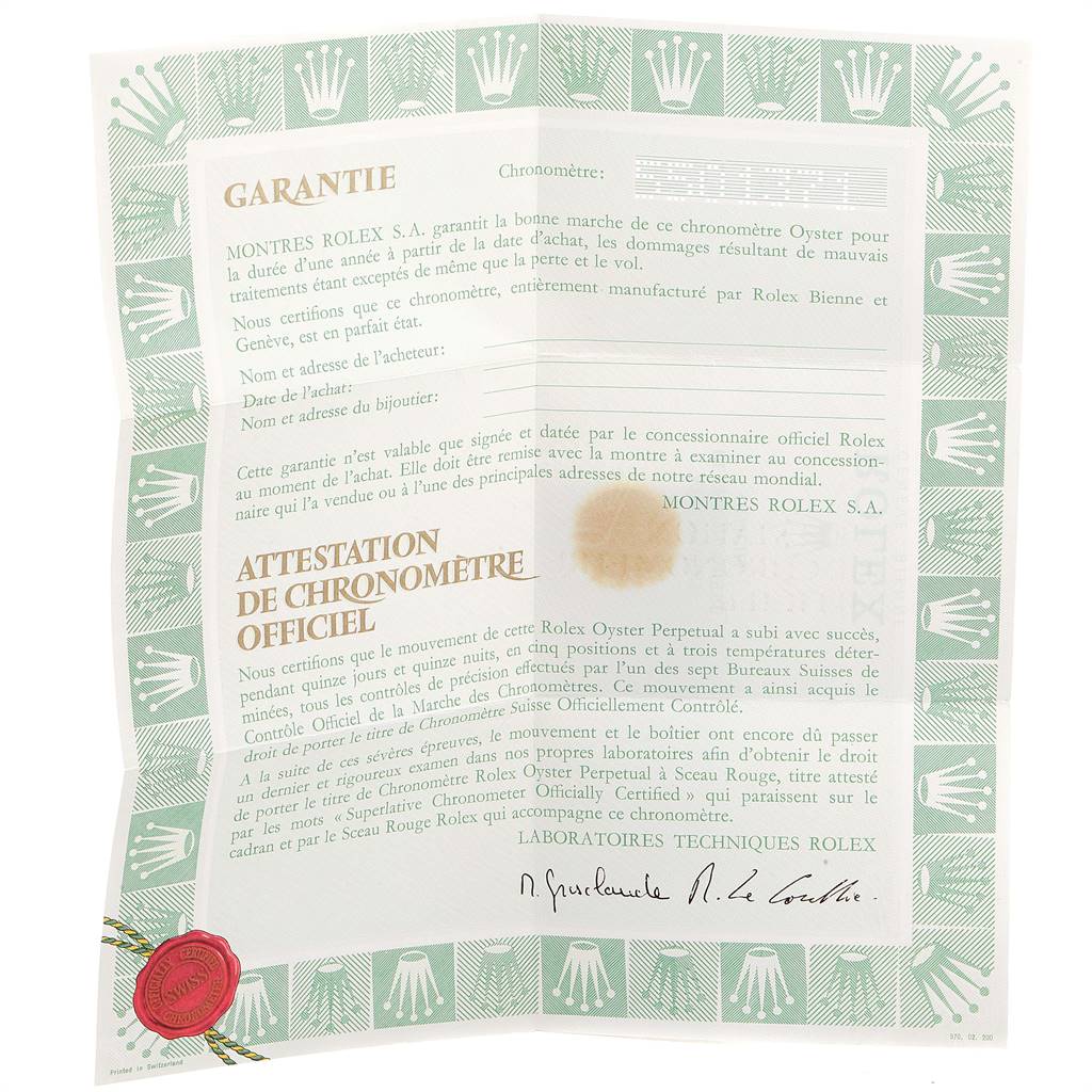 The image shows the warranty and certification paperwork for a Vintage Collection model by Rolex, featuring logos and text.