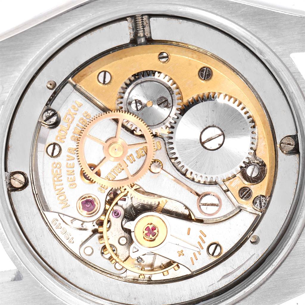 This image shows the internal components and movement mechanism of the Vintage Collection model by Rolex, viewed from the back.