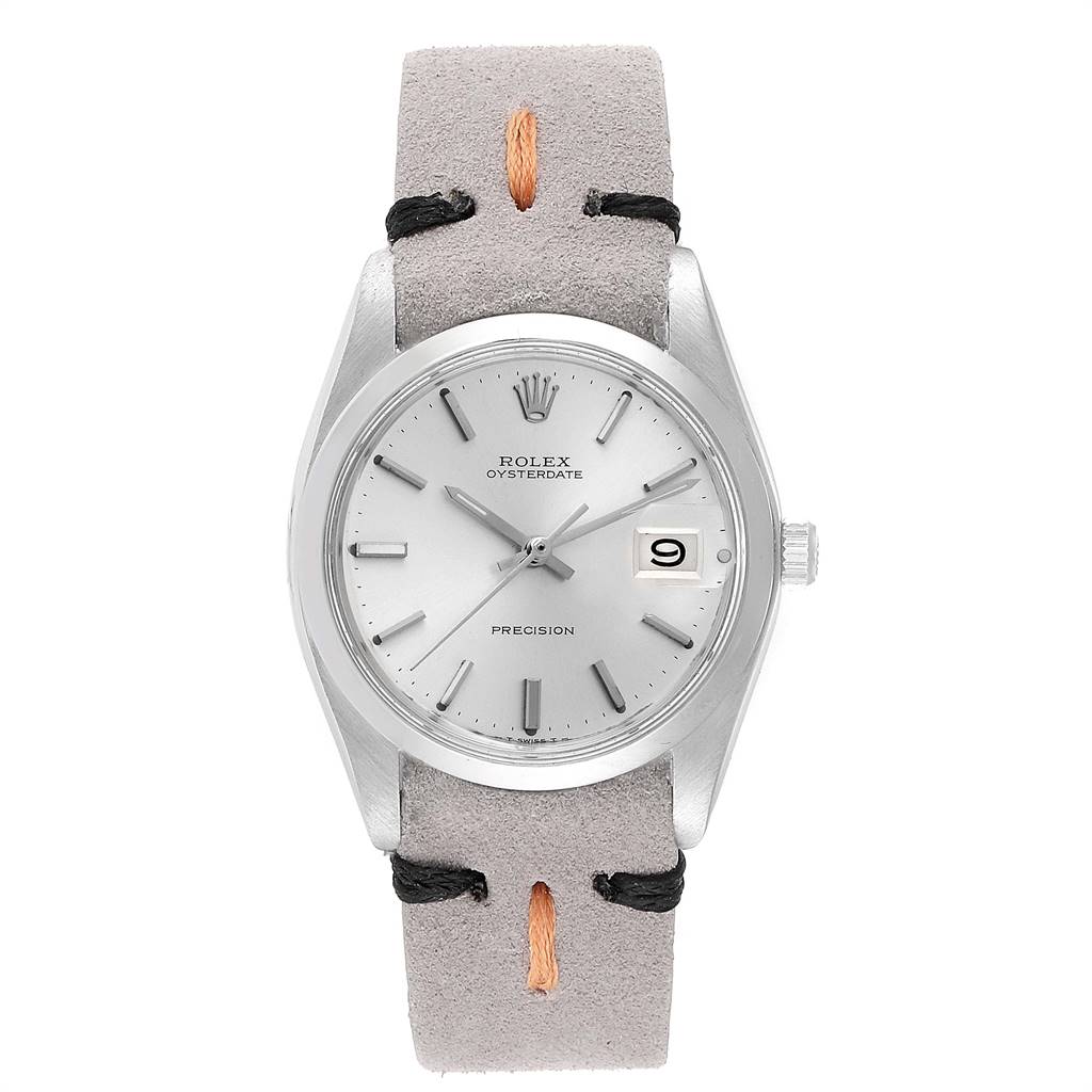 The image shows a front view of the Rolex Vintage Collection 6694 Men's Stainless Steel Silver Dial 6694 Men's Stainless Steel Silver Dial watch, displaying its face and grey suede strap.