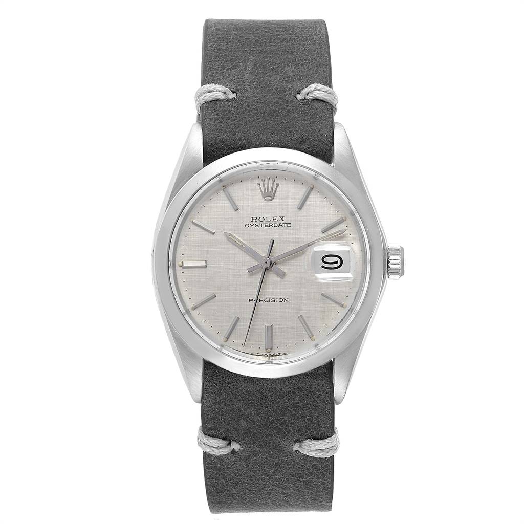 The image shows a front view of a Rolex Vintage Collection 6694 Men
s Stainless Steel Silver Dial 6694 Men
s Stainless Steel Silver Dial Oysterdate watch with a grey leather strap.