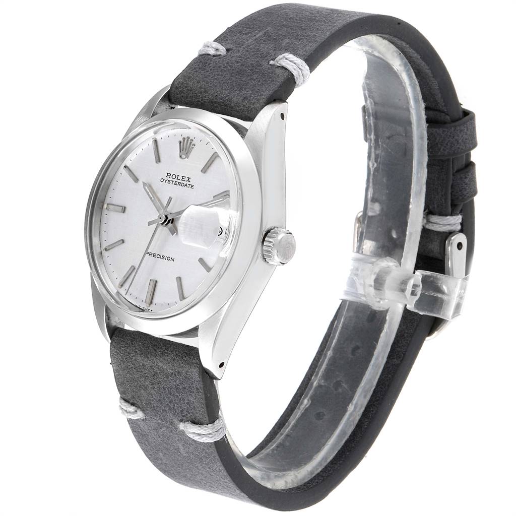 The Rolex Vintage Collection 6694 Men
s Stainless Steel Silver Dial 6694 Men
s Stainless Steel Silver Dial watch is shown at a three-quarter angle, highlighting the face, crown, and leather strap.