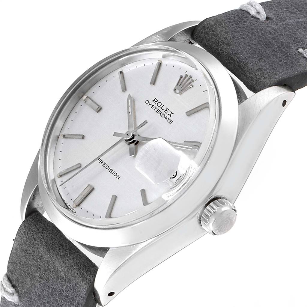 The image shows a tilted angle of the face and crown of the Vintage Collection Rolex Oysterdate watch.