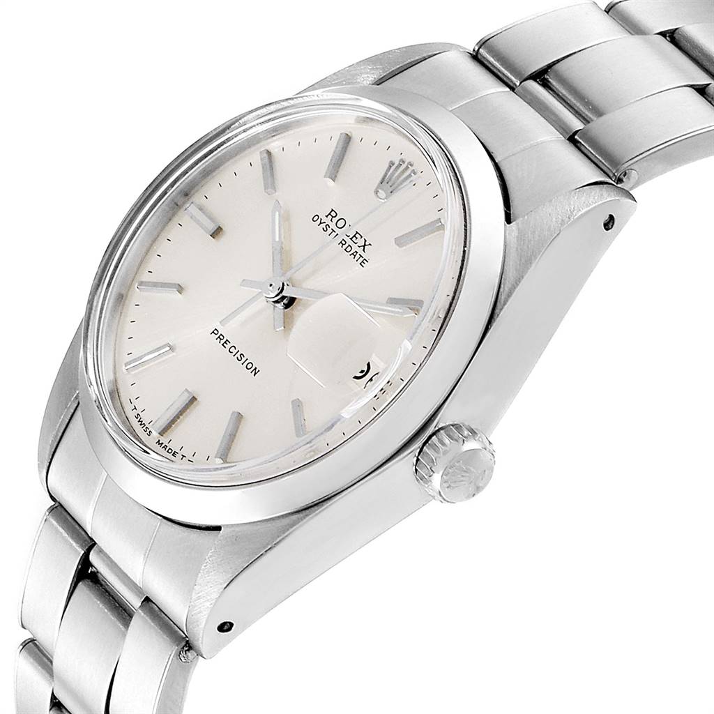 The image shows a Rolex Vintage Collection 6694 Men's Stainless Steel Silver Dial 6694 Men's Stainless Steel Silver Dial Oysterdate watch at a tilted angle, highlighting its dial, crown, and bracelet.