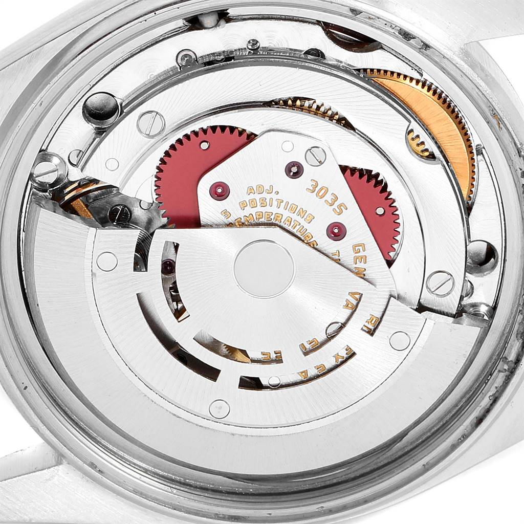 The image shows the internal mechanism of the Rolex Vintage Collection 16014 Men
s Stainless Steel Silver Dial 16014 Men
s Stainless Steel Silver Dial model watch from the back, highlighting its gears and components.