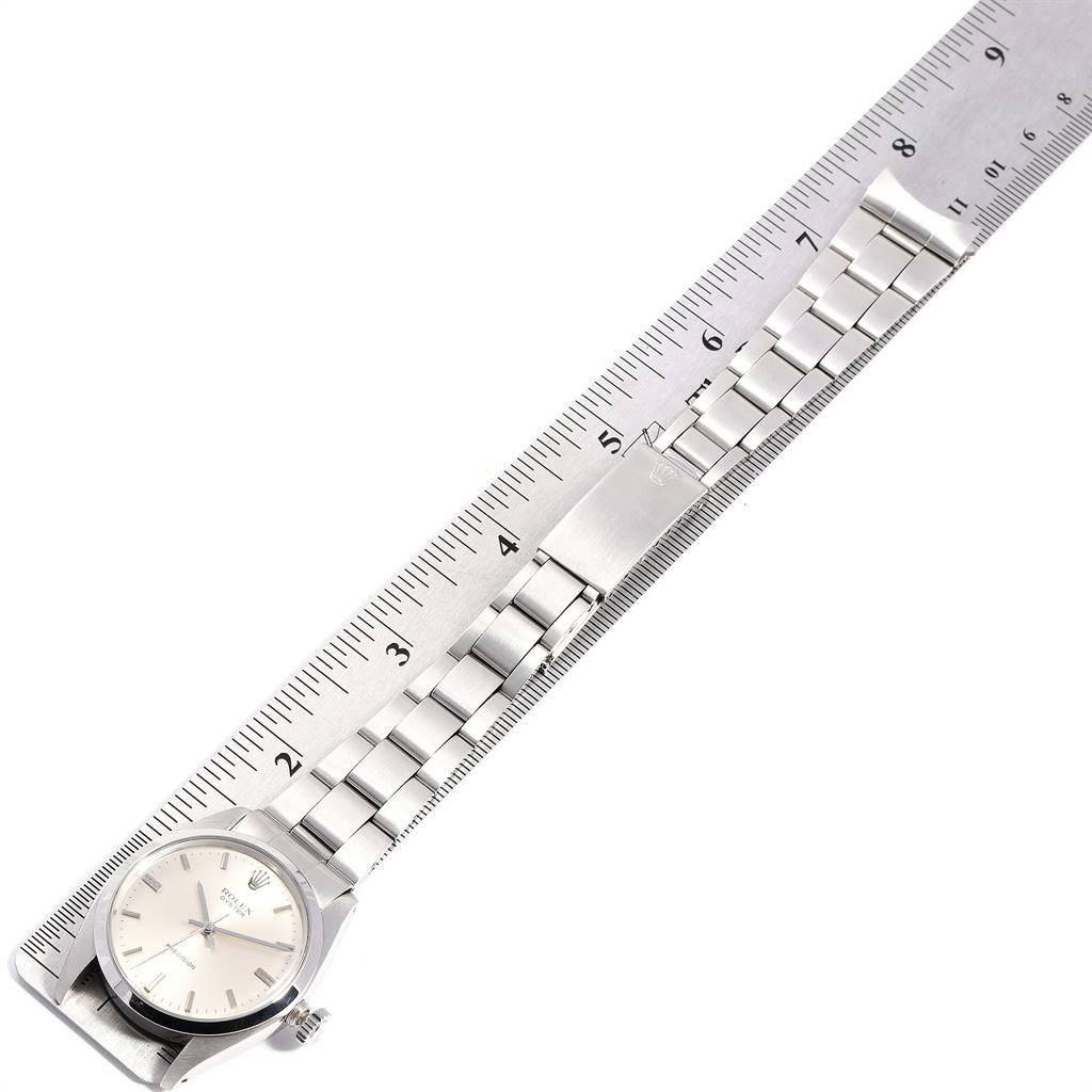 The Rolex Vintage Collection 6426 Men
s Stainless Steel Silver Dial 6426 Men
s Stainless Steel Silver Dial watch is shown flat, with its entire bracelet laid parallel to a ruler for measurement.
