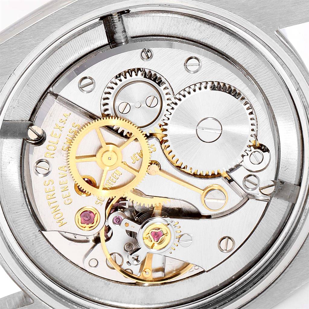 This image shows the intricate internal movement and gears of a Rolex Vintage Collection 6426 Men
s Stainless Steel Silver Dial 6426 Men
s Stainless Steel Silver Dial watch.