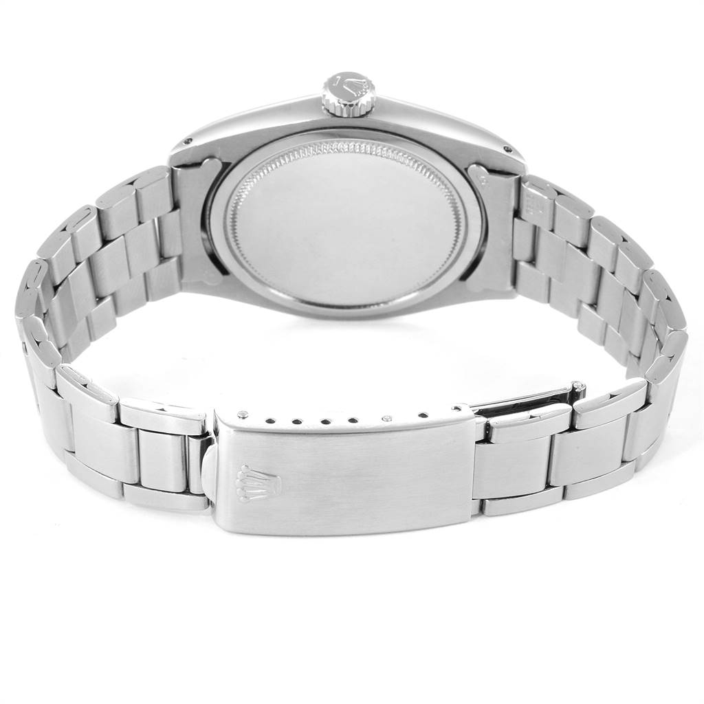 The image shows the back of the Rolex Vintage Collection 6426 Men
s Stainless Steel Silver Dial 6426 Men
s Stainless Steel Silver Dial watch, highlighting the case back, bracelet, and clasp.