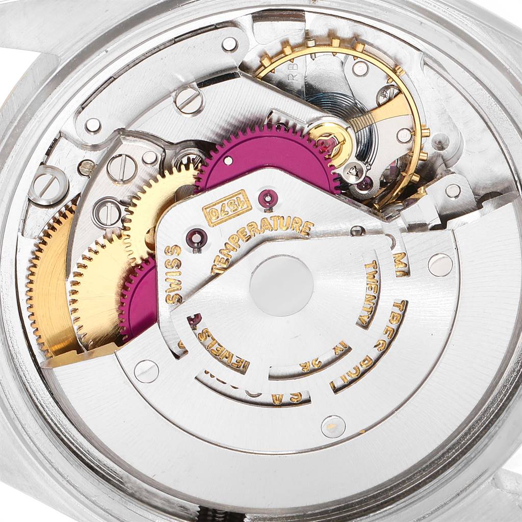 The image shows the intricate internal mechanism of the Vintage Collection model by Rolex, viewed from the back.