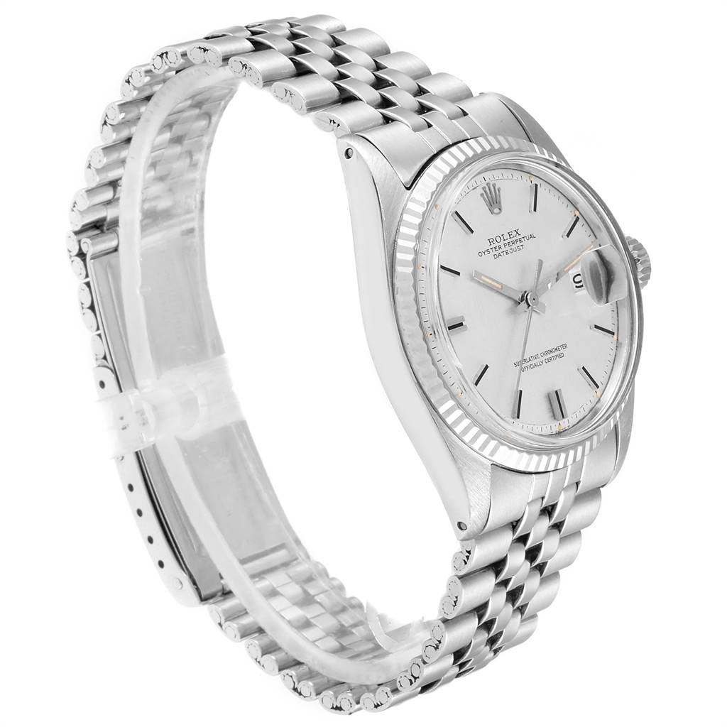 The Vintage Collection Rolex watch is shown at a 3/4 angle highlighting the face, bezel, and bracelet.