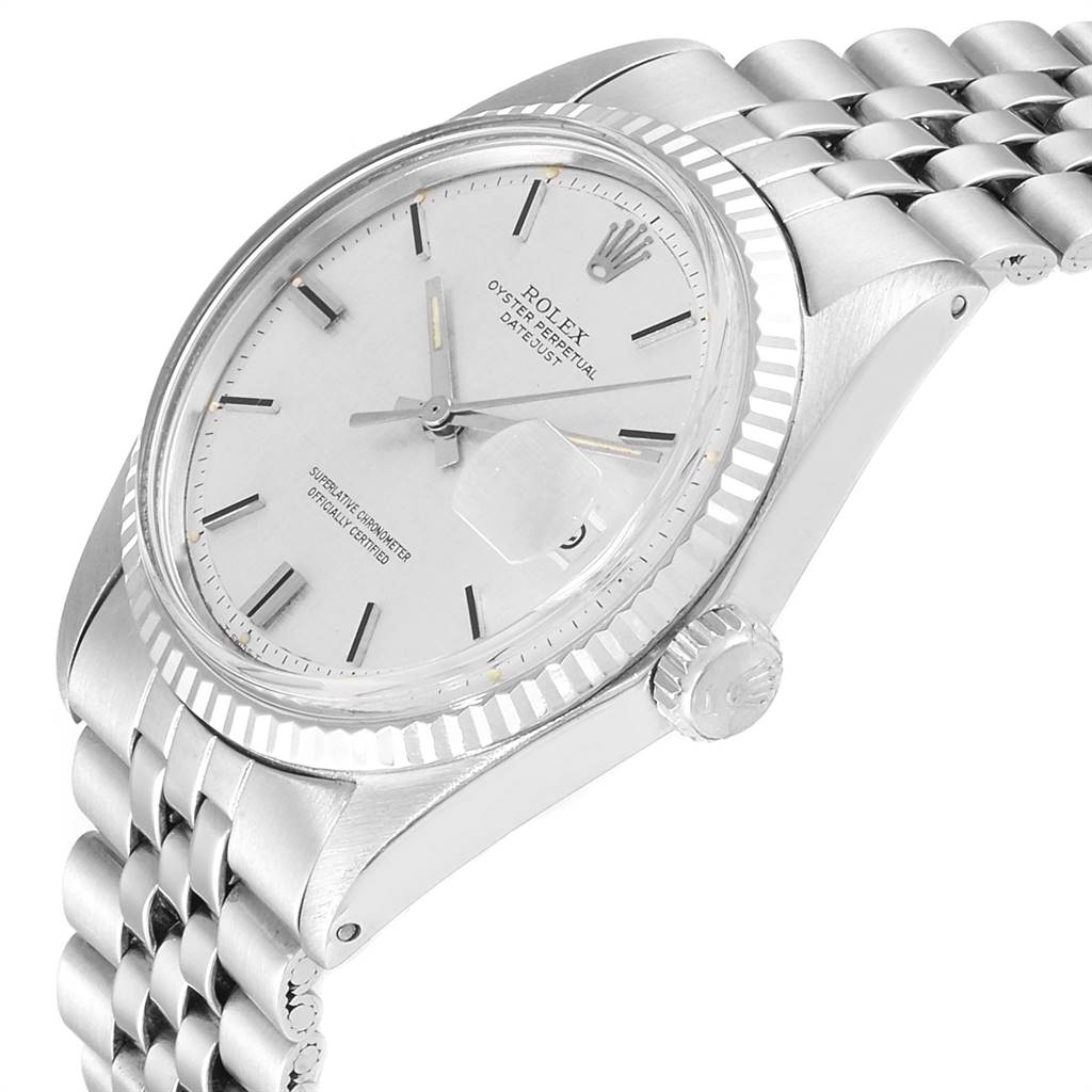 The image shows a side angle of the Rolex Vintage Collection 1601 Men
s Stainless Steel Silver Dial 1601 Men
s Stainless Steel Silver Dial watch case, bezel, crown, and partial bracelet.
