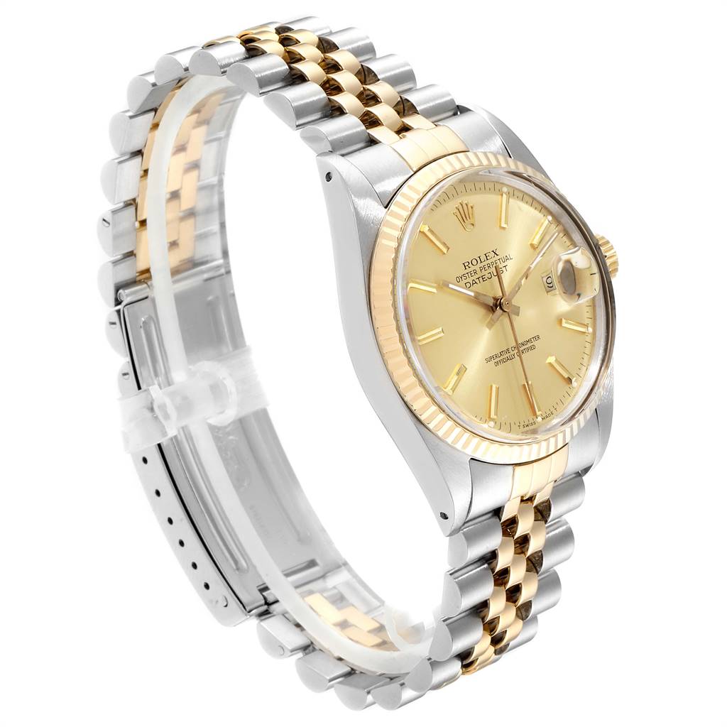 This Rolex Vintage Collection 16013 Men's Stainless Steel Champagne Dial 16013 Men's Stainless Steel Champagne Dial model is angled to show the gold dial, bezel, and two-tone bracelet.