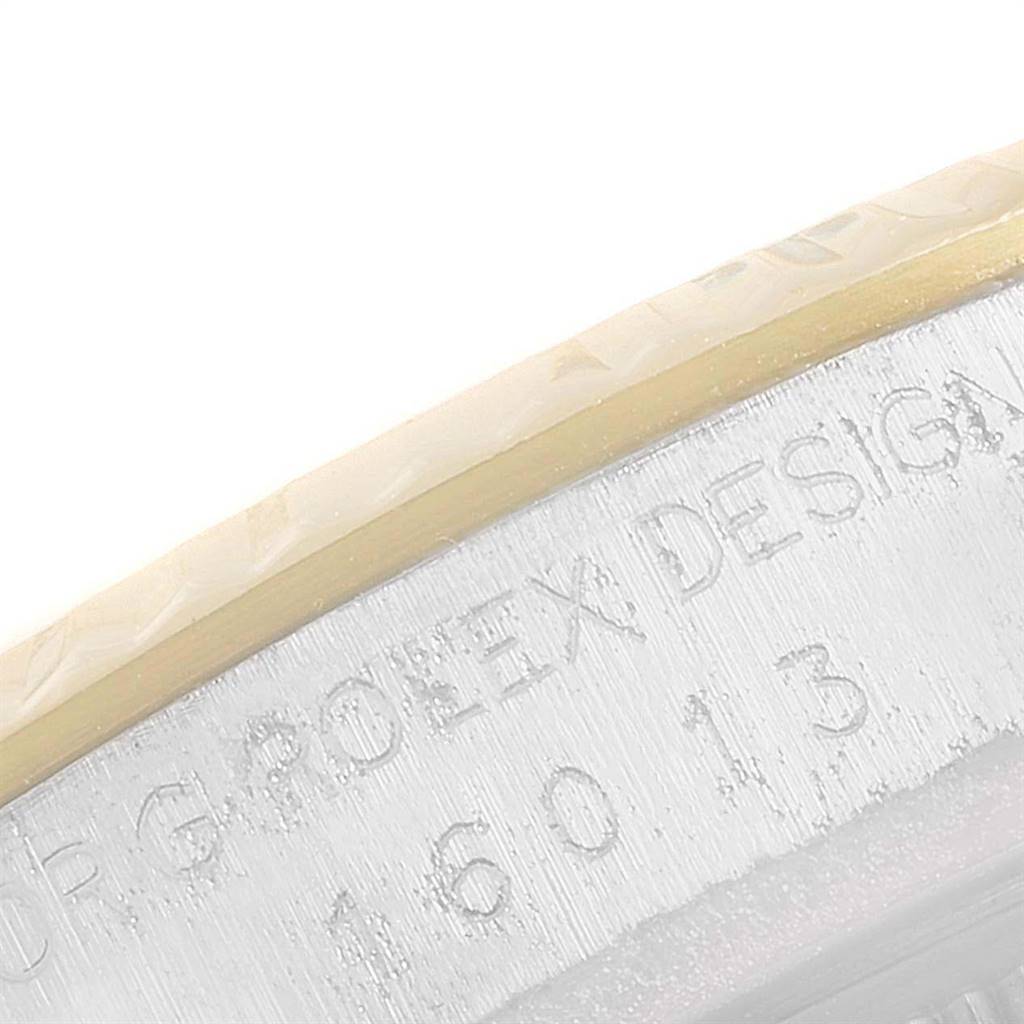 This image shows an up-close view of the outer edge of the case back of a Rolex Vintage Collection 16013 Men's Stainless Steel Champagne Dial 16013 Men's Stainless Steel Champagne Dial model watch.