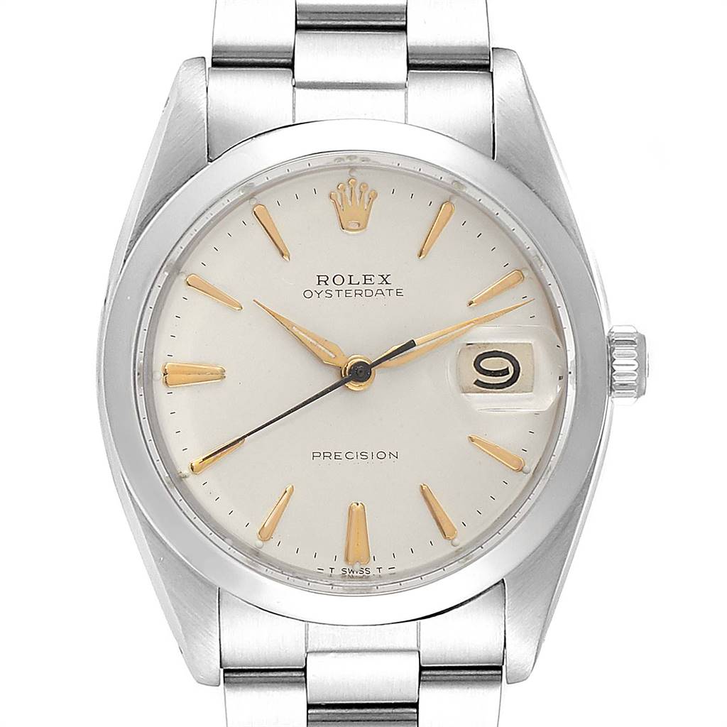 The image shows a front view of a Rolex Vintage Collection 6694 Men
s Stainless Steel Silver Dial 6694 Men
s Stainless Steel Silver Dial Oysterdate watch, highlighting the dial, hour markers, and date window.