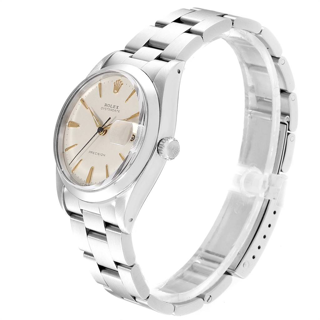 The Rolex Vintage Collection 6694 Men
s Stainless Steel Silver Dial 6694 Men
s Stainless Steel Silver Dial watch is shown from a three-quarter angle, highlighting the face, crown, and stainless steel bracelet.