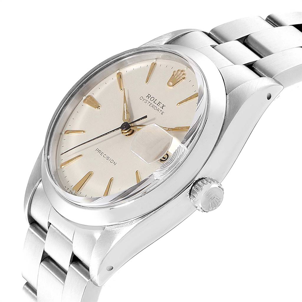 A Vintage Collection Rolex watch is shown at an oblique angle, highlighting its face, crown, and part of its bracelet.