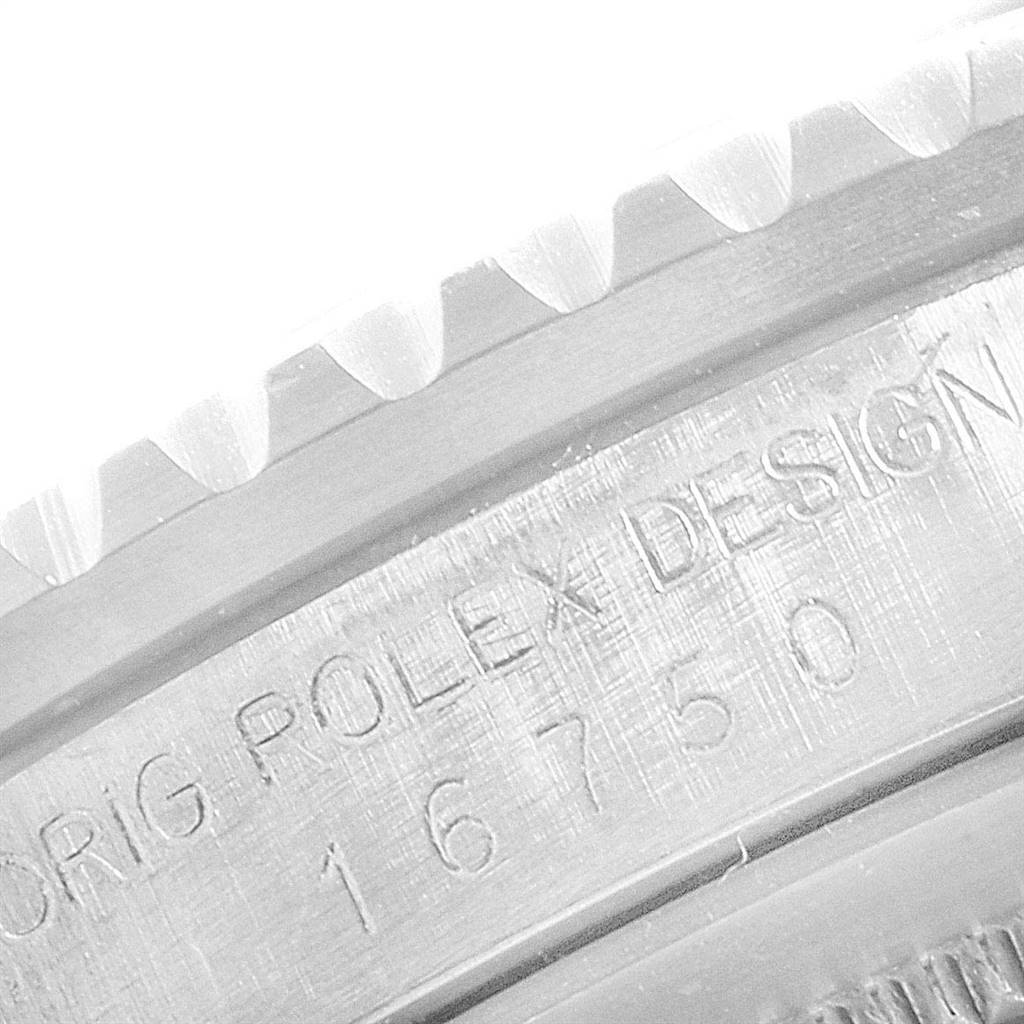 This macro shot shows the engraved serial number and part of the bezel of a Rolex Vintage Collection 16750 Men
s Stainless Steel Black Dial 16750 Men
s Stainless Steel Black Dial model.