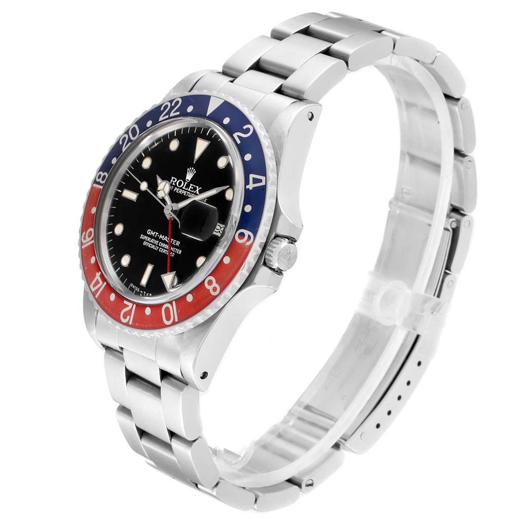The image shows a side and angled view of the Rolex Vintage Collection 16750 Men
s Stainless Steel Black Dial 16750 Men
s Stainless Steel Black Dial GMT-Master watch with a metal bracelet and a blue and red bezel.