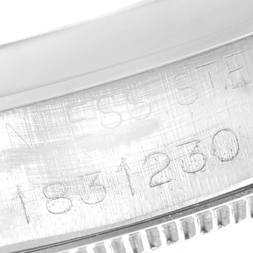 This close-up image shows the engraved serial number on the stainless steel case of a Rolex Vintage Collection 5500 Men
s Stainless Steel Silver Dial 5500 Men
s Stainless Steel Silver Dial watch.