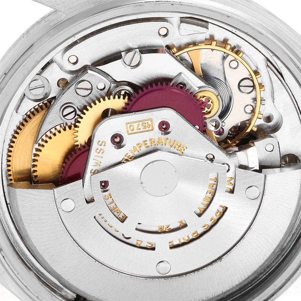 The image shows a close-up of the internal mechanical movement of the Vintage Collection watch by Rolex.