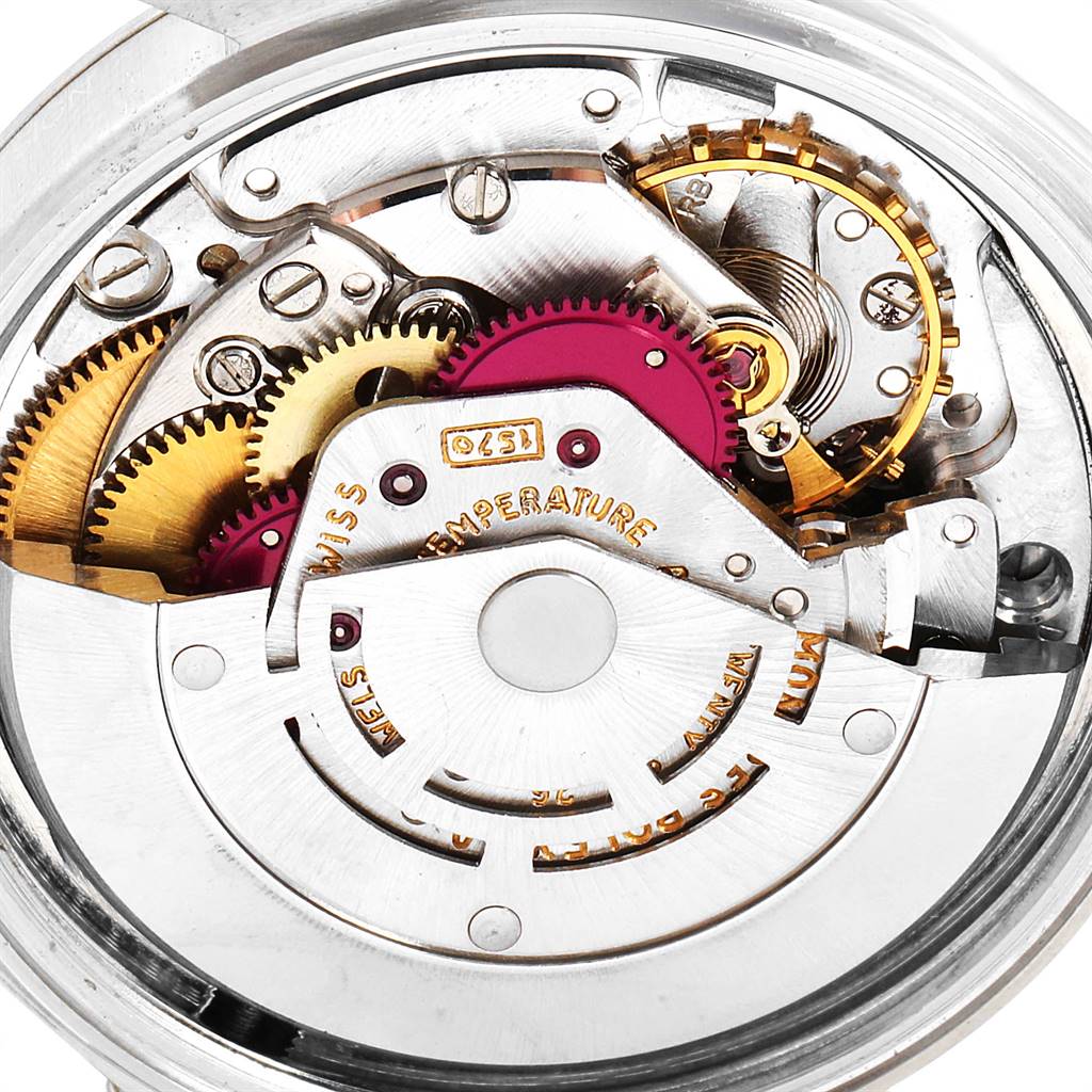 This image shows the internal mechanism of a Rolex Vintage Collection 1601 Men's Stainless Steel Silver Dial 1601 Men's Stainless Steel Silver Dial watch, highlighting its gears and intricate components.