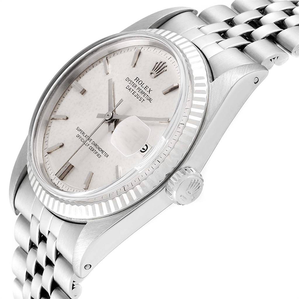 The image shows a side view of a Vintage Collection Rolex Oyster Perpetual Datejust watch, highlighting the dial, bezel, and crown.