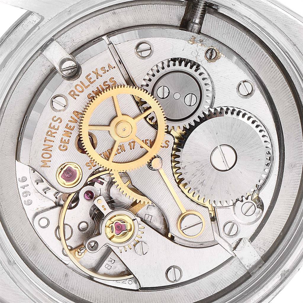 This image shows the intricate internal mechanism and gears of the Rolex Vintage Collection 6426 Men
s Stainless Steel Silver Dial 6426 Men
s Stainless Steel Silver Dial watch.
