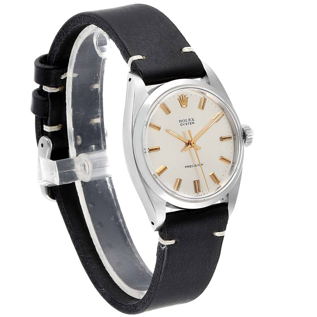 The image shows a Rolex Vintage Collection 6426 Men
s Stainless Steel Silver Dial 6426 Men
s Stainless Steel Silver Dial watch at a 3/4 angle, showcasing the face, crown, and black leather strap.