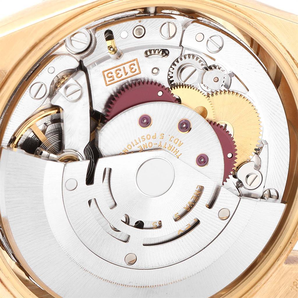 This image shows the internal mechanics of the Rolex Vintage Collection 15238 Men's Yellow Gold Champagne Dial 15238 Men's Yellow Gold Champagne Dial watch, including gears and the rotor.