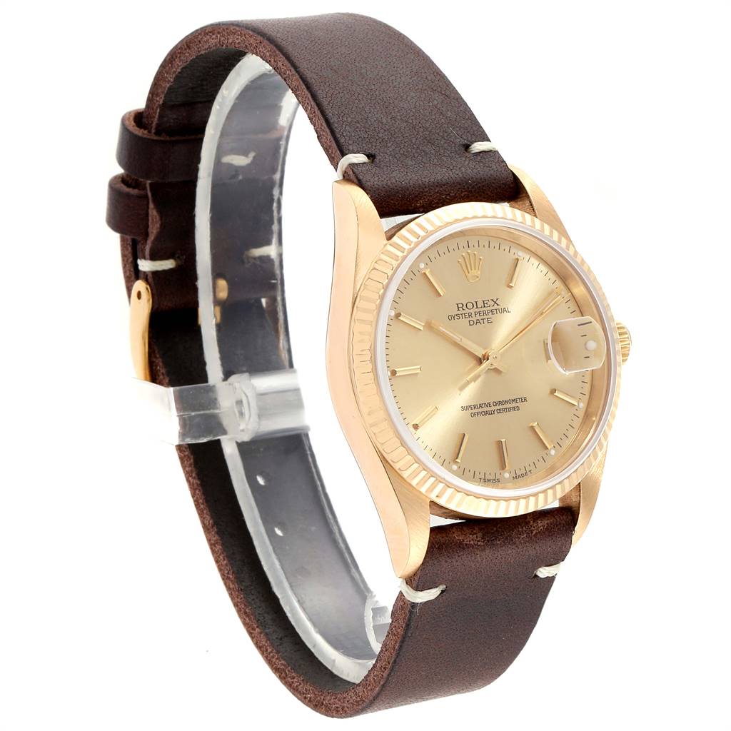 The Rolex Vintage Collection 15238 Men's Yellow Gold Champagne Dial 15238 Men's Yellow Gold Champagne Dial model is shown at a slight angle, displaying its gold-tone dial, bezel, and brown leather strap.