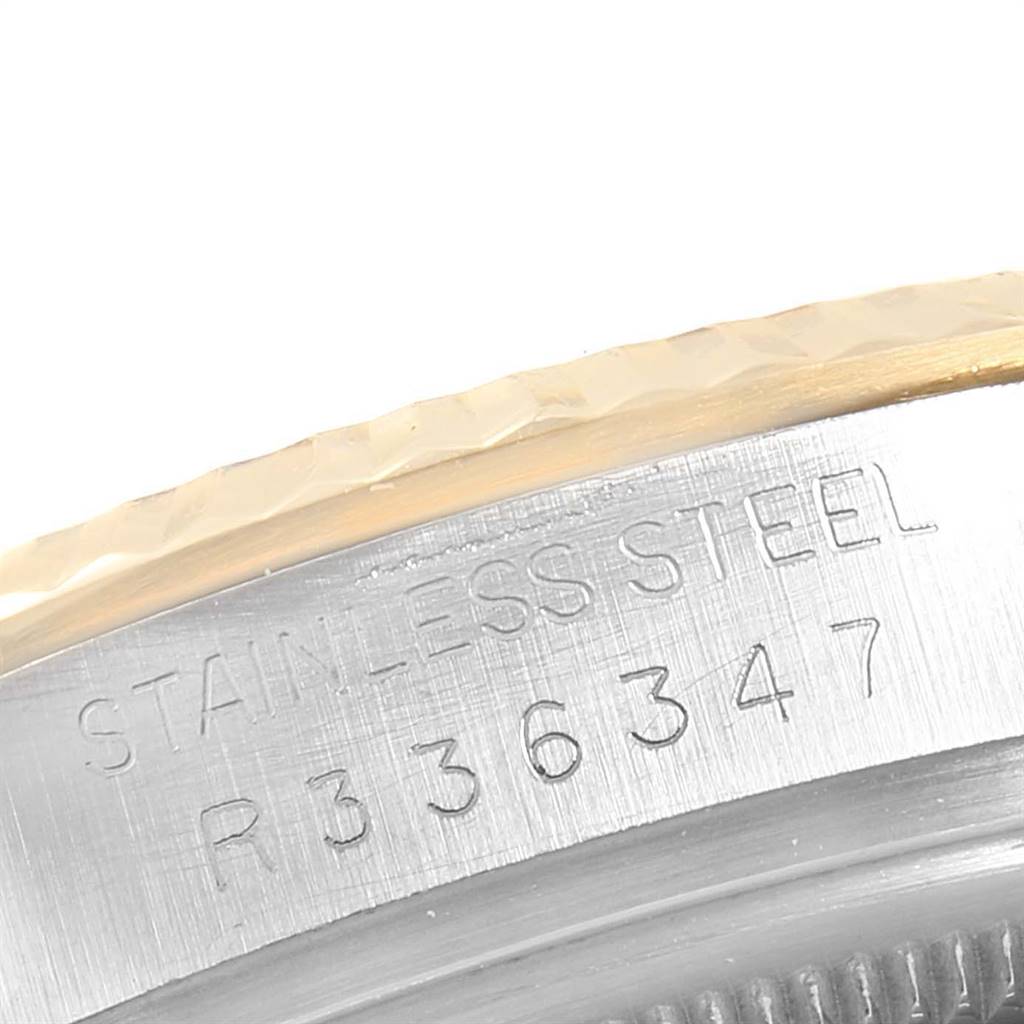 The image shows a close-up of the case back and the bezel of a Rolex Vintage Collection 16013 Men's Stainless Steel White Dial 16013 Men's Stainless Steel White Dial watch, displaying part of its serial number.