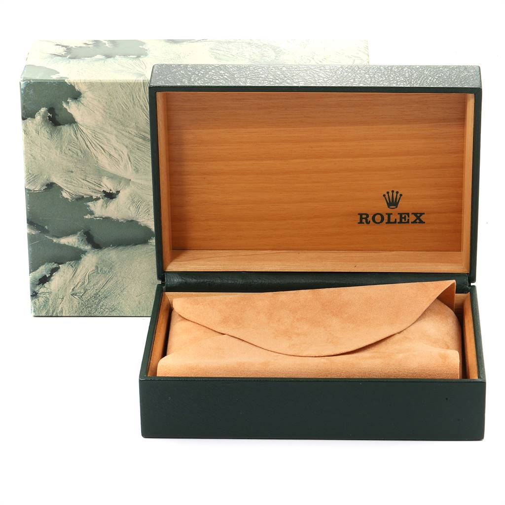 The image shows an open Rolex Vintage Collection 16013 Men's Stainless Steel White Dial 16013 Men's Stainless Steel White Dial watch box, revealing the inner wooden compartment and a suede watch pillow.