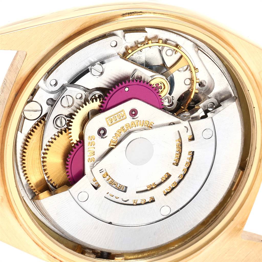 This image shows the intricate internal mechanical components of the Rolex Vintage Collection 1803 Men's Yellow Gold Champagne Dial 1803 Men's Yellow Gold Champagne Dial watch, highlighting gears and movements.