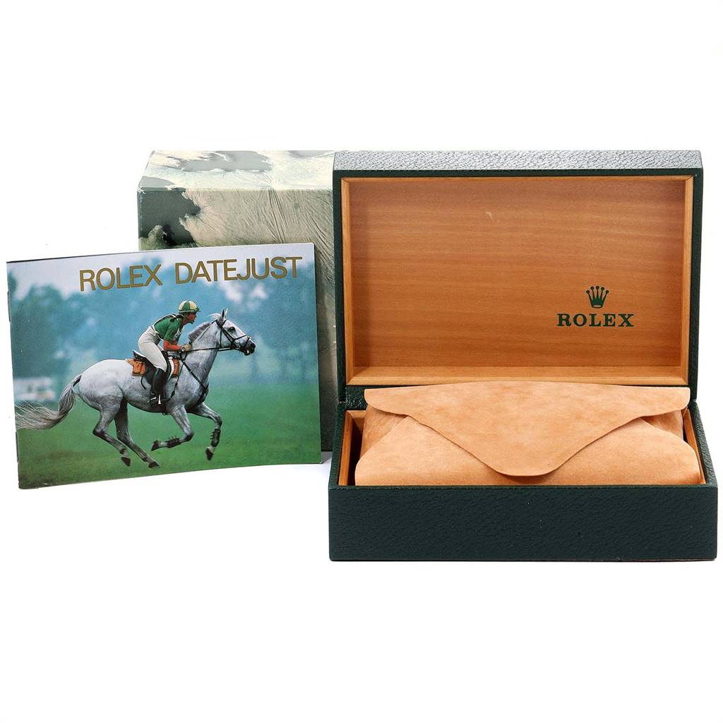 This image shows the packaging and booklet for the Rolex Vintage Collection 26251 Men
s Steel and Gold (two tone) Champagne Dial 26251 Men
s Steel and Gold (two tone) Champagne Dial Datejust model, including a box and suede pouch.