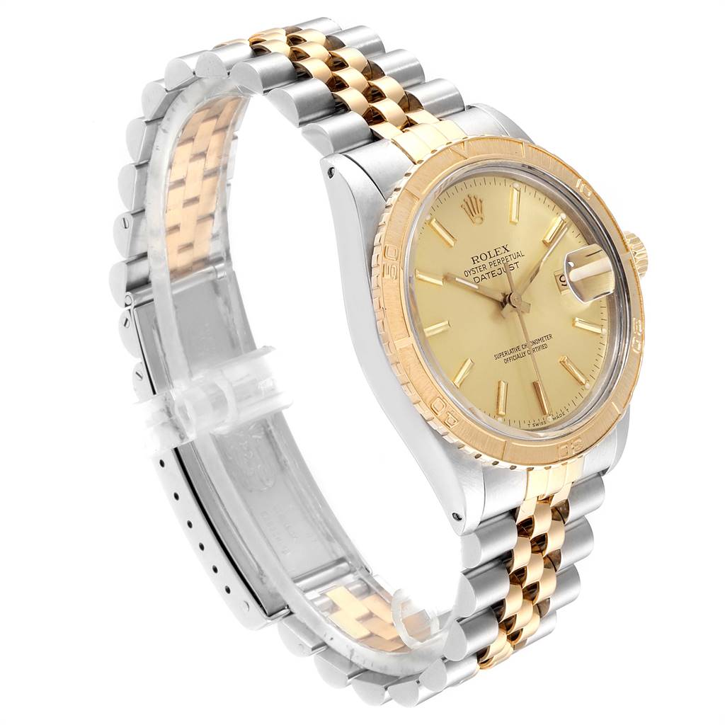 The Vintage Collection Rolex is shown at a 3/4 angle, highlighting the watch face, crown, and two-tone bracelet.