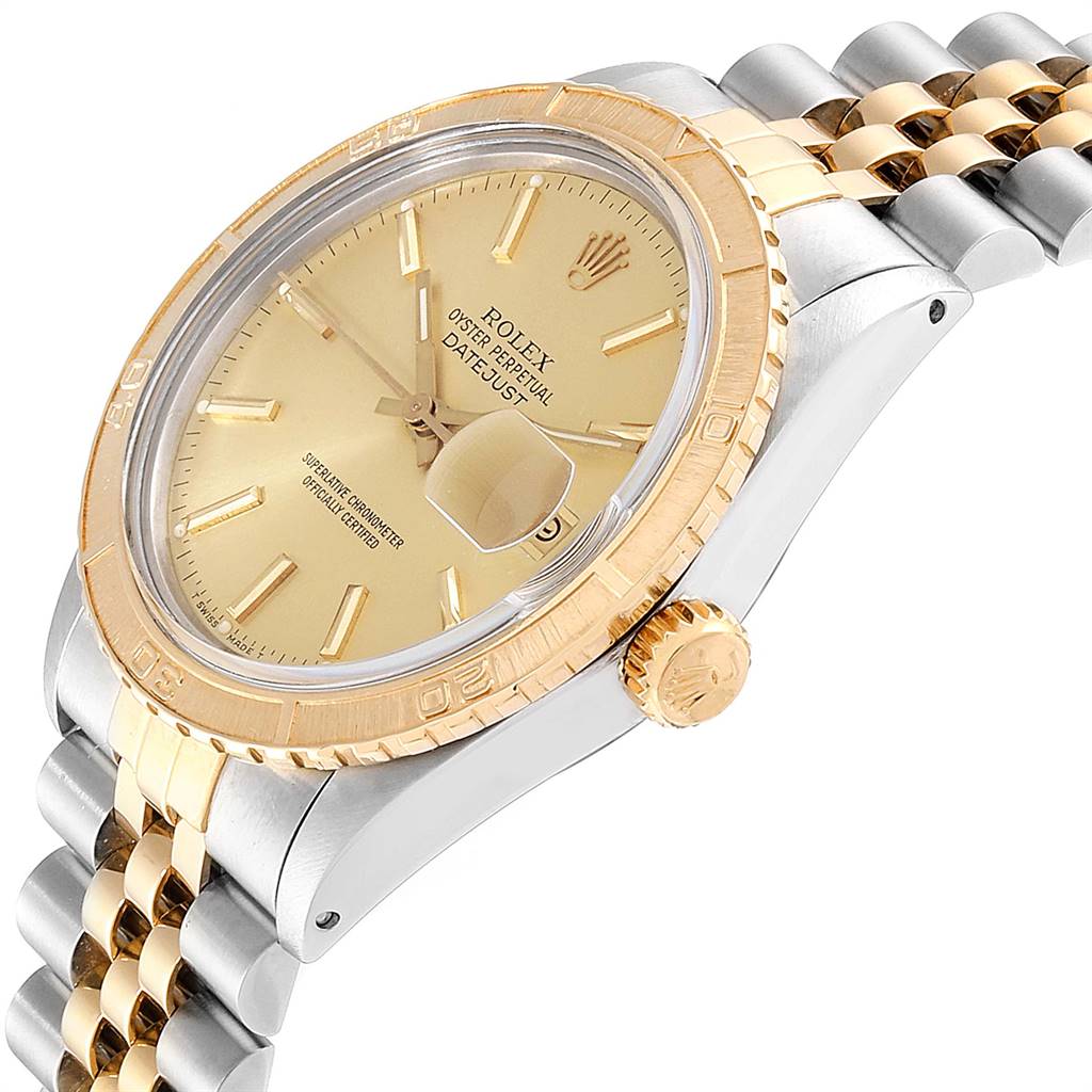 The Rolex Vintage Collection 26251 Men
s Steel and Gold (two tone) Champagne Dial 26251 Men
s Steel and Gold (two tone) Champagne Dial watch is shown at a side angle, displaying its face, bezel, crown, and part of the bracelet.
