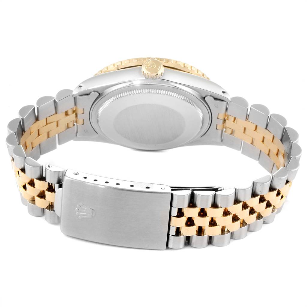 This image shows the back view of the Rolex Vintage Collection 26251 Men
s Steel and Gold (two tone) Champagne Dial 26251 Men
s Steel and Gold (two tone) Champagne Dial watch, featuring its two-tone bracelet, clasp, and case back.