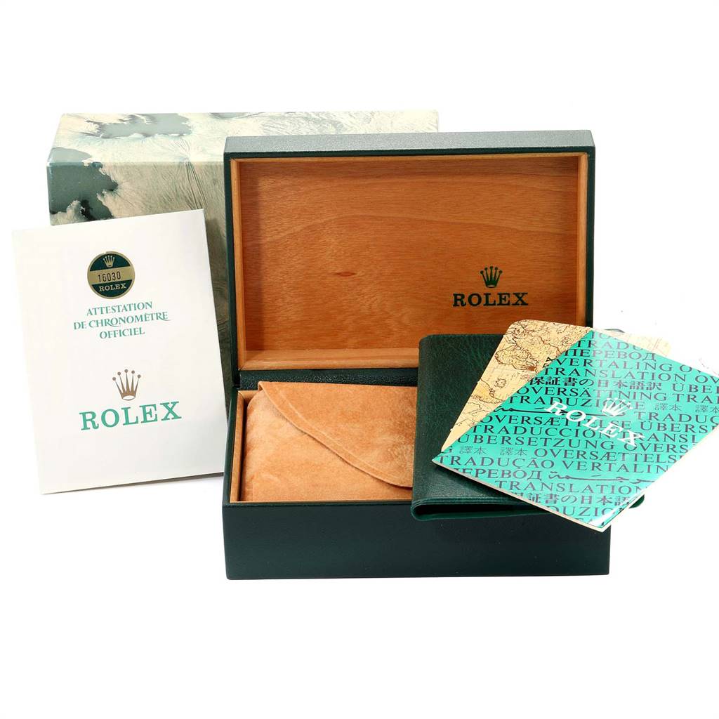 The image shows the open box, booklet, and papers for the Rolex Vintage Collection 16030 Men's Stainless Steel Grey Dial 16030 Men's Stainless Steel Grey Dial model.